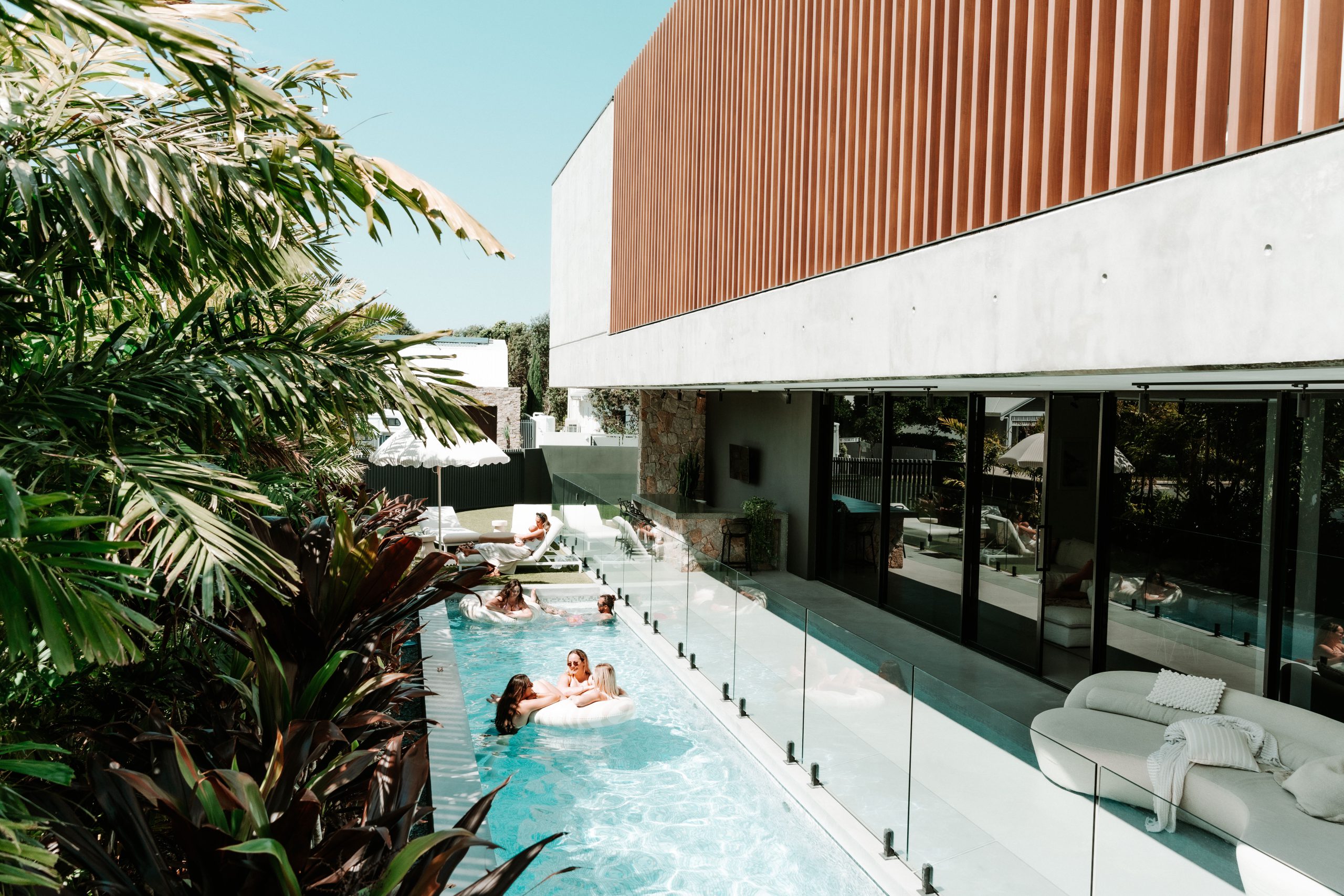 Poolside loungers at Mana Beach House