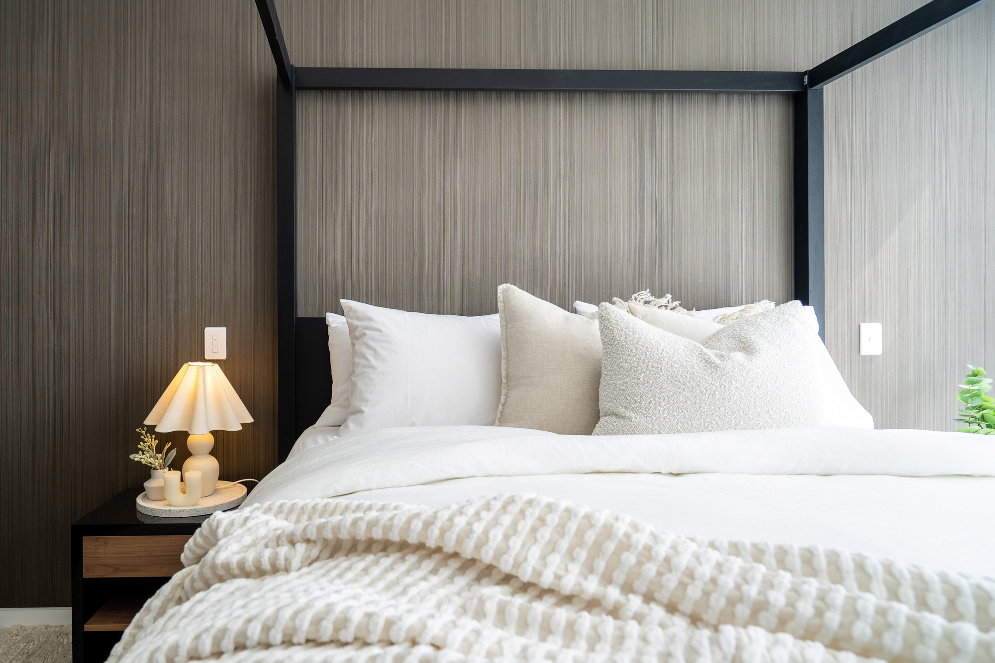 Master suite with king four-poster bed